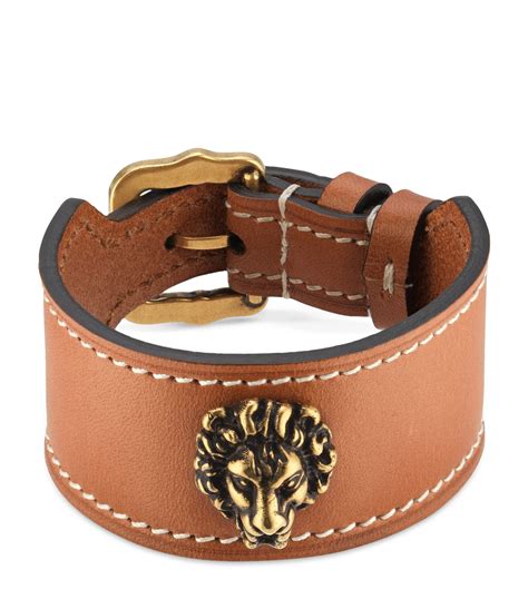 leather gucci bracelet with lion head|luxury leather gold bracelet.